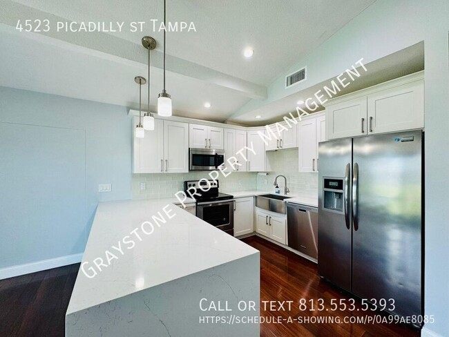 Foto del edificio - "Charming 3-Bedroom Home in Prime Tampa Lo...