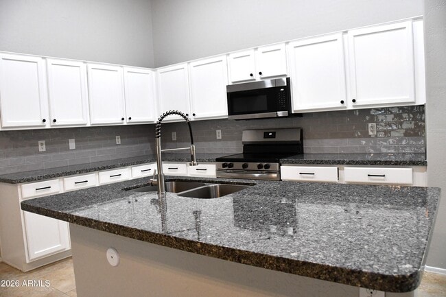 Building Photo - 8787 W Gardenia Ave