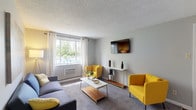 Located at 2143 Winslow Dr in Columbus, Ohio, this single-floor residence offers a well-organized layout with distinct living, sleeping, and functional spaces throughout. The living room serves as the heart of the home, featuring plush wall-to-wall carpeting, a textured ceiling, and a large window that frames views of mature trees outside, filling the room with natural light. Neutral gray walls provide a versatile backdrop throughout the space.

The kitchen is outfitted with ample white cabinetry, generous counter space with warm-toned laminate countertops, and a full suite of appliances, offering a practical and efficient cooking environment.

The unit includes multiple bedrooms, each carpeted and equipped with windows that allow natural light to flow in. The primary bedroom features a ceiling fan and multiple windows, creating a comfortable and airy retreat. Additional bedrooms offer closet space and room for varied uses.

The full bathroom is finished with a tub-shower combination, a white vanity with storage, and wood-look flooring, providing a clean and functional space. Throughout the residence, a cohesive neutral color palette creates a calm, inviting atmosphere well-suited for everyday living.