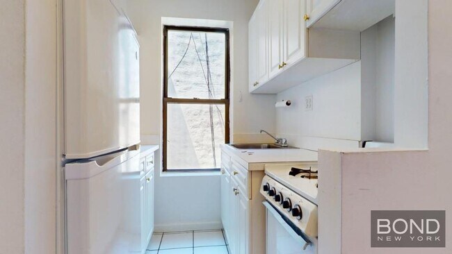 Foto del edificio - 411 E 70th St