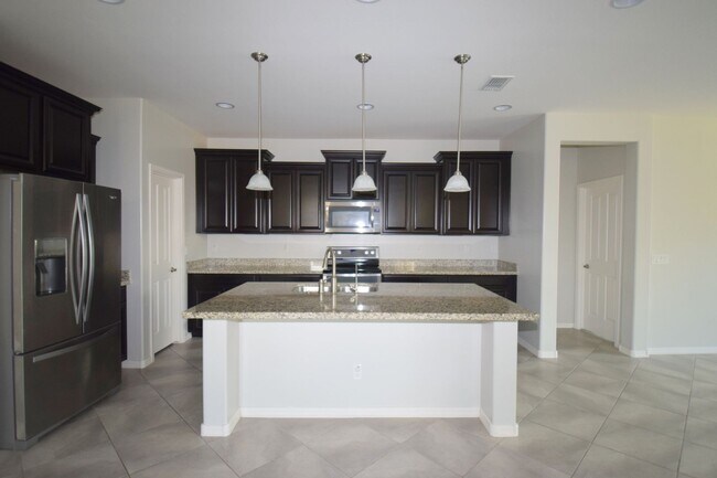 Foto del edificio - Beautiful single level 4 bedroom 2.5 bath Gilbert home.