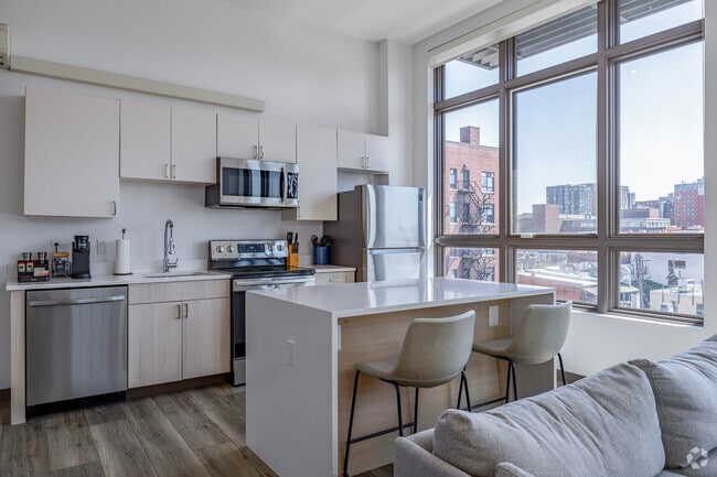 Interior Photo - Exhibit A2 Furnished Luxury Apartments