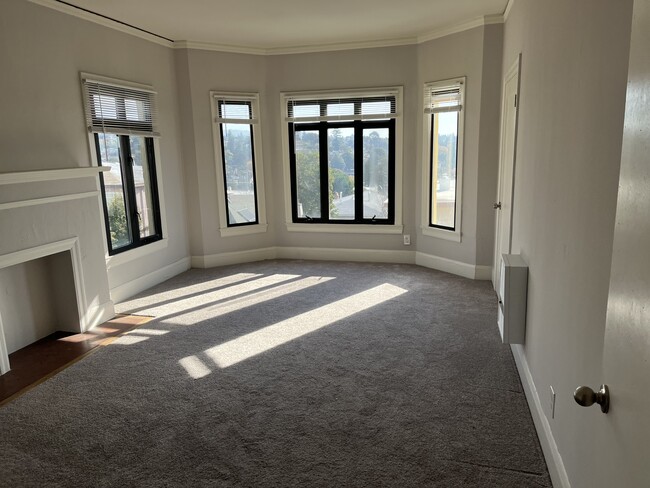 #1 Light filled living room w faux fireplace - 859 Warfield Ave