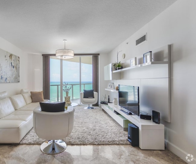 Building Photo - 16699 Collins Ave