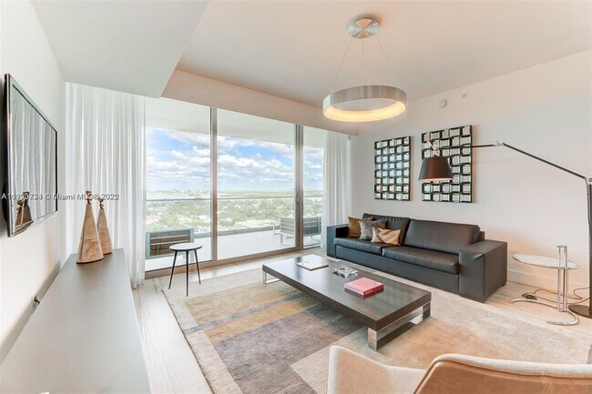 Building Photo - 10203 Collins Ave