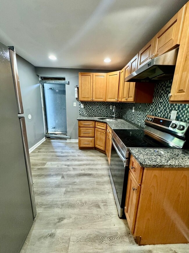 Building Photo - Updated 3-Bedroom Home with Basement and B...