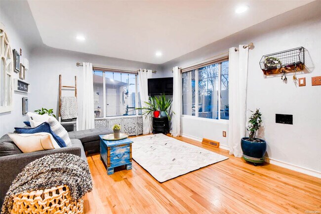 Entertain in the open living area boasting great natural lighting! - 4320 Quivas St