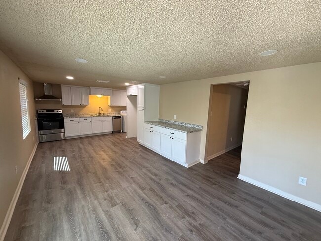 Open Living Area with New Flooring - 760 Wayne Ave
