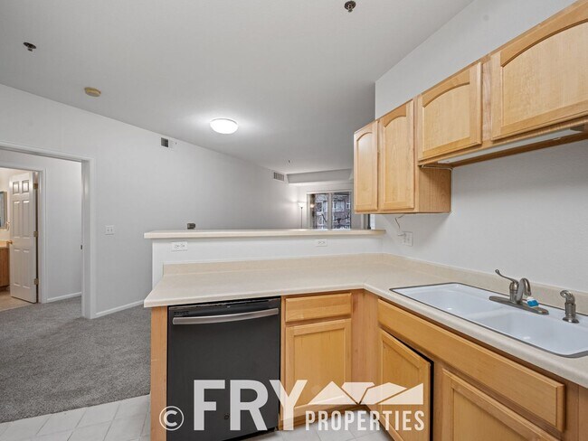 Building Photo - Lovely Condo in 55+ Community