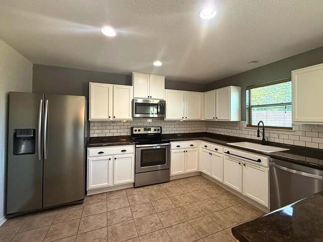 Building Photo - 5127 Mustang Cove