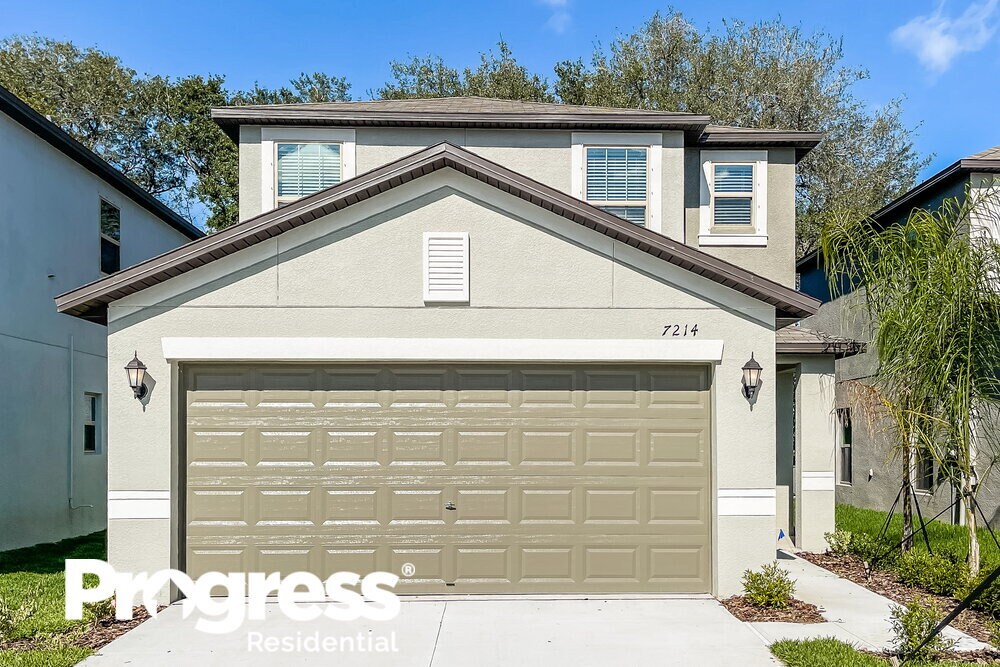 7214 Spring Snowflake Ave, Palm RiverClair Mel, FL 33619 House