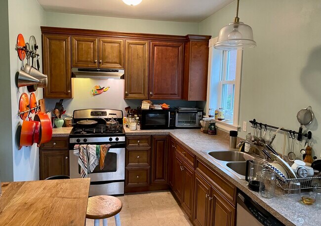 Modern appliances in the kitchen and lots of storage space. - 202 Laurel St