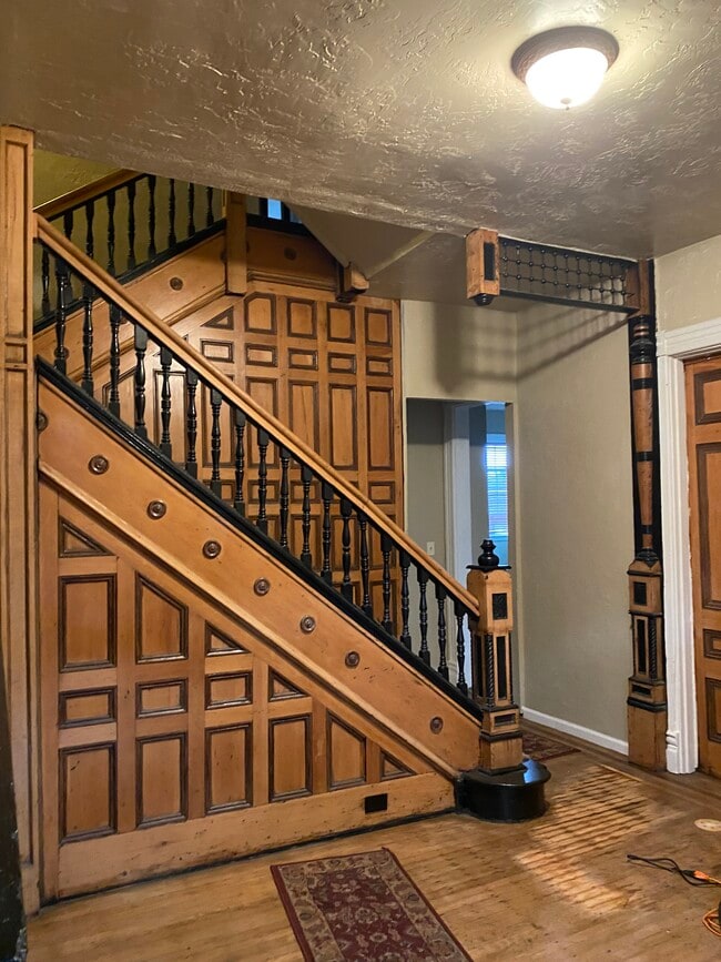 stairwell in foyer - 7131 Penn Ave