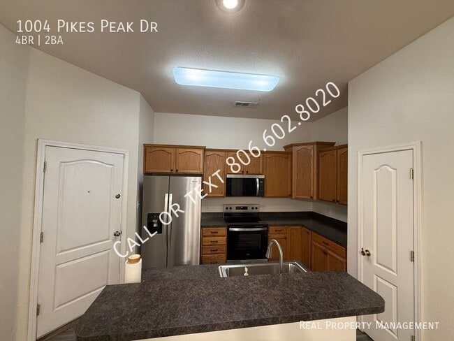 Building Photo - 1004 Pikes Peak Dr