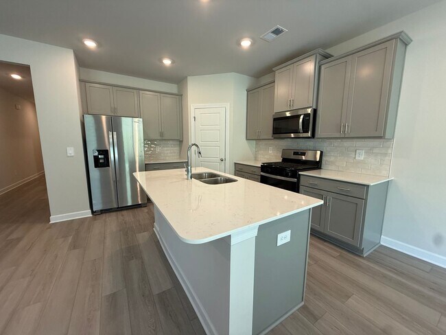 Building Photo - Modern Living Meets Everyday Comfort