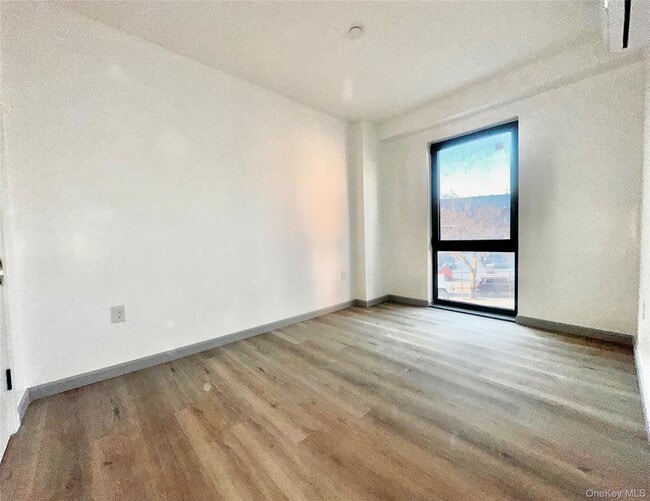 Building Photo - 70-65 Queens Blvd