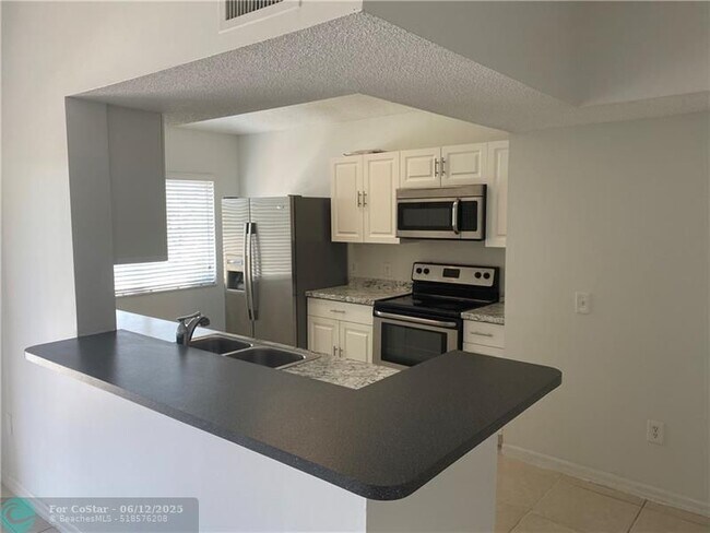 Foto del edificio - 9640 NW 2nd St