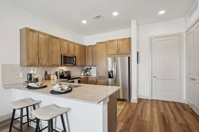 Building Photo - The Residences at Promontory