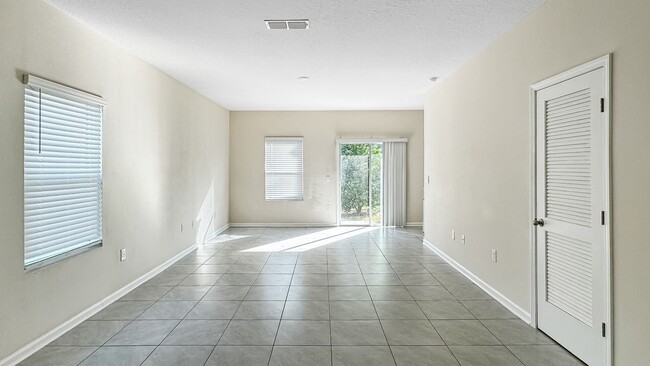Building Photo - Pet-Friendly Corner Unit with Attached Garage & Smart Home Features