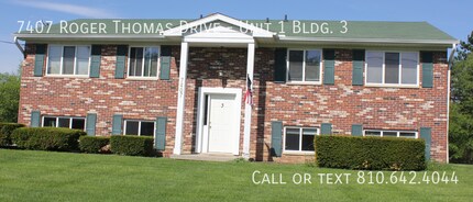 Building Photo - 7407 Roger Thomas Dr