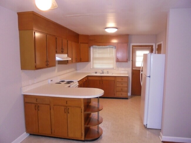 Foto del edificio - Cozy one level apartment with hardwood floors