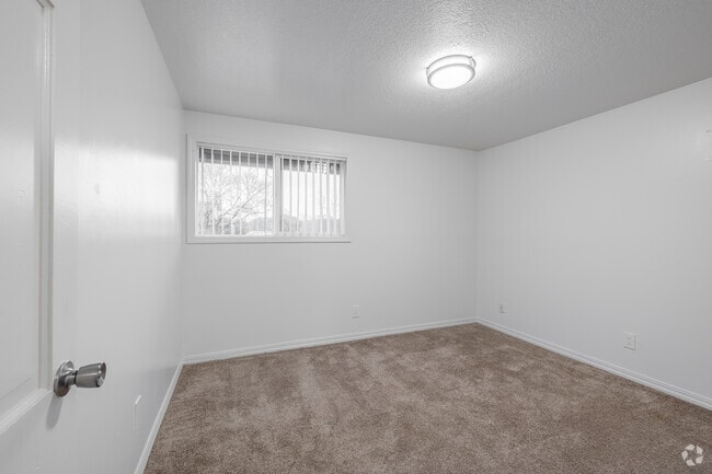 2BR, 1BA- 753SF - Primary Bedroom - Colonial Villa Apartments