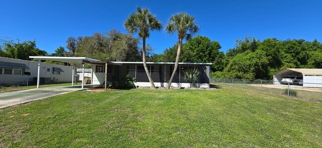 Building Photo - 2 bed 2 bath with carport.