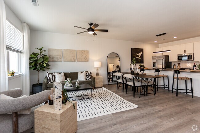 Northrup Falls, 3 habitaciones, 2.5 baños - 1,659 pies cuadrados - Sala de estar - Steele Landing Townhome Rentals
