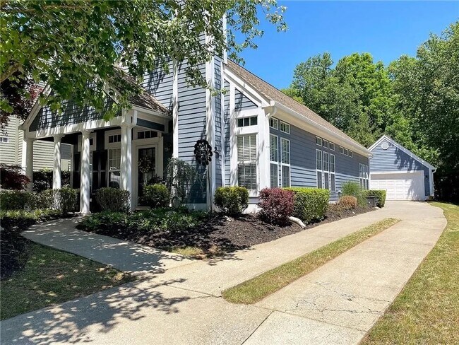 Side view of cottage home - 351 Pinehurst Way