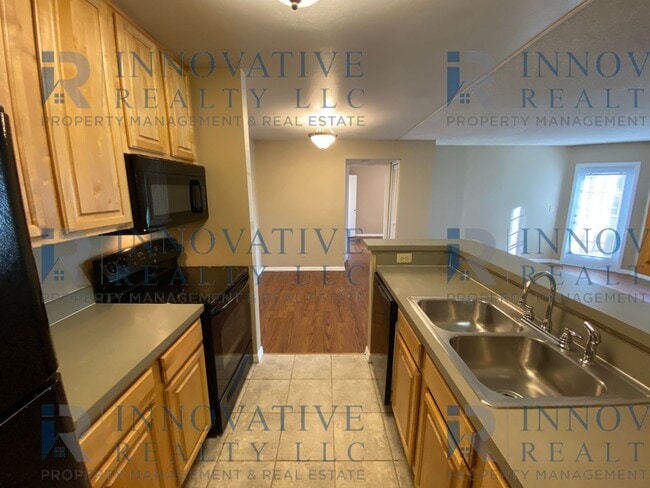 Building Photo - 2BD/2BA First Floor Condo with Private Patio!