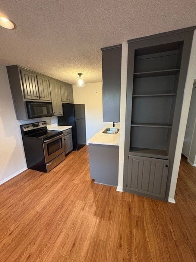 Building Photo - Modern 2BR/2BA Condo – Newly Remodeled Kitchen & Prime Location!