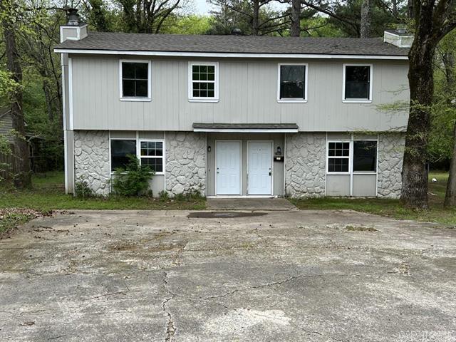 Front of Home - Rain gutters and rain shield have been added - 2301 Dorchester Dr