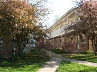 Carriage House Exterior - Carriage House Apartments