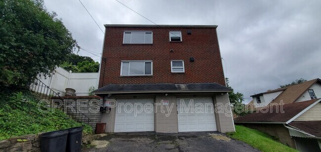Building Photo - 5708-5708 Poketa Rd