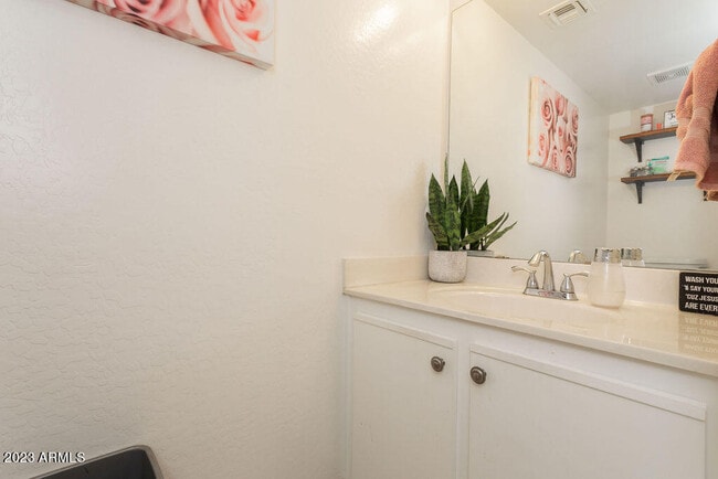 Main floor half bathroom - 455 S Mesa Dr