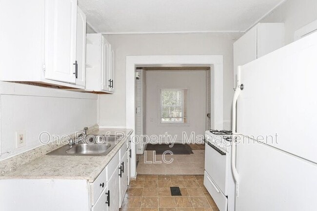 Building Photo - 3228-3230 E 8th St