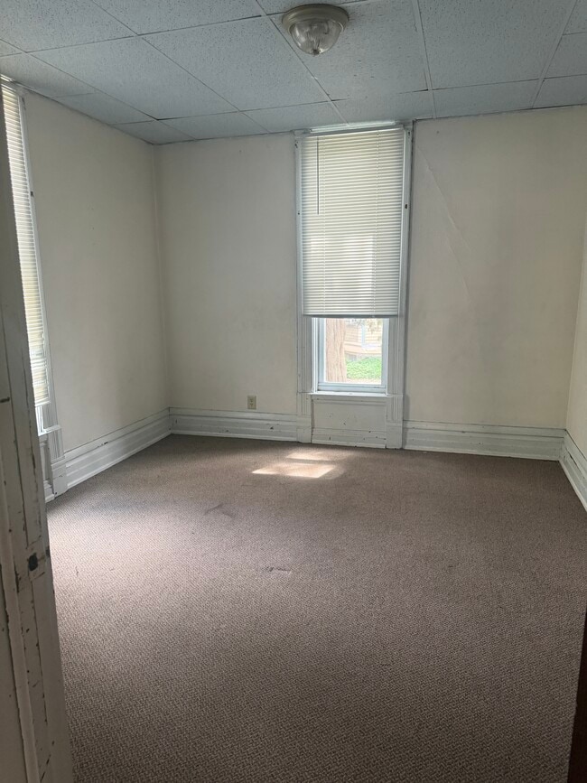 Bed 2 with closet - carpet being replaced - 216 S. College Avenue