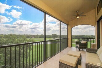 Building Photo - 7024 Pelican Bay Blvd