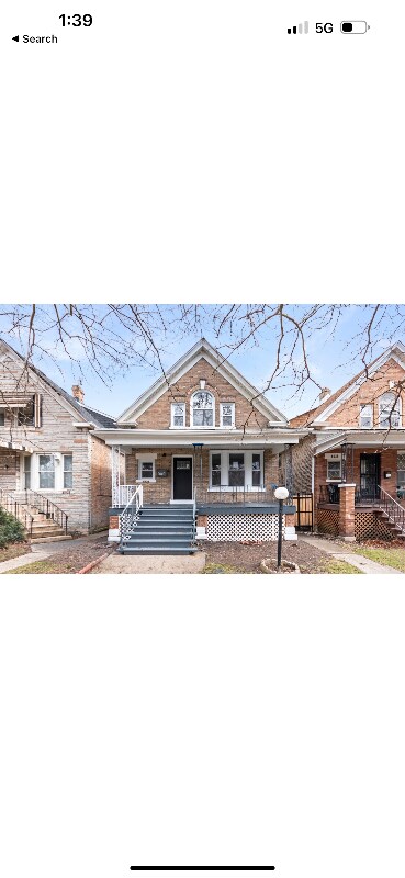 Foto principal - 6935 S Michigan Ave