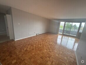 Building Photo - 1061 Queen's Blvd