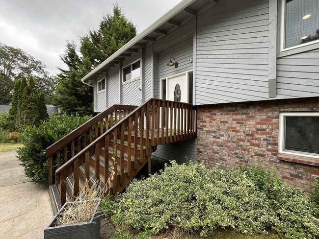 Photo - Three-Bedroom Home Near Nike Campus with Bonus Room, Large Deck & Two-Car Garage