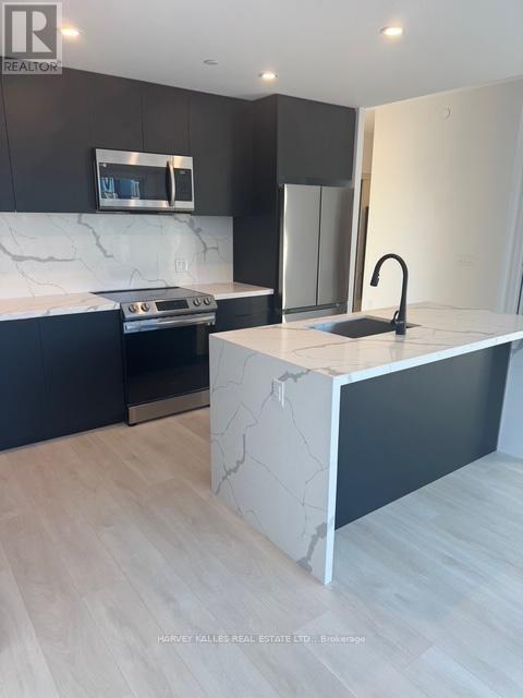 Photo du bâtiment - 415-415 Sea Ray Ave