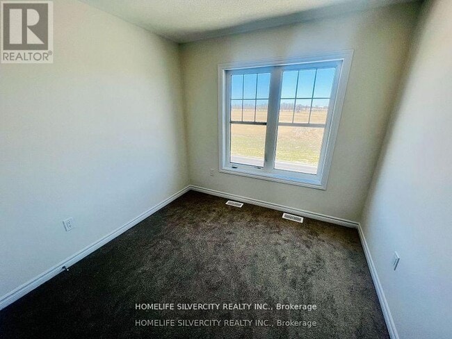 Photo du bâtiment - 12324 McLaughlin Rd