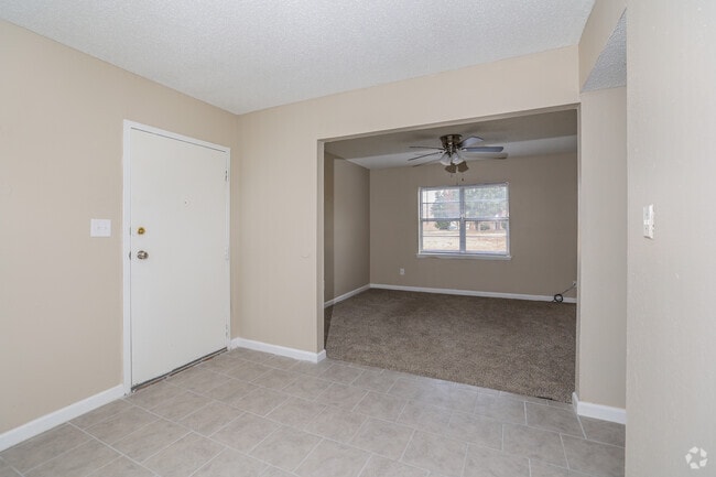 1BR, 1BA - 620SF - Living and Dining Area - Maple Wood Apartments