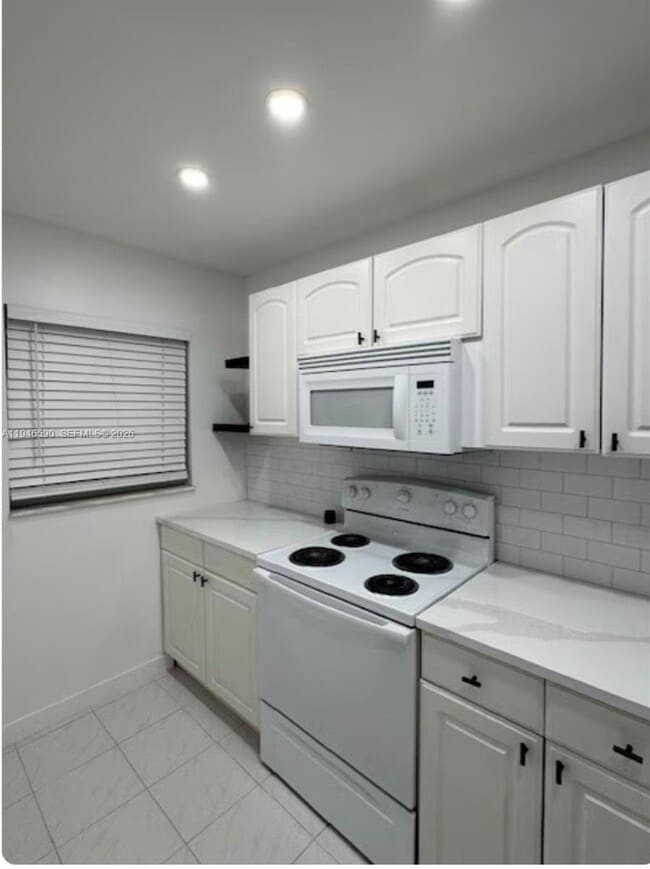 Building Photo - 9460 Poinciana Pl