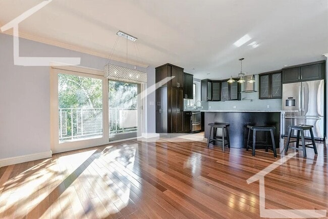 Building Photo - (Promo: $500 Utility Rebate!) STATE OF THE ART Gem in Coolidge Corner!  Covered Parking. Ht & HW ...