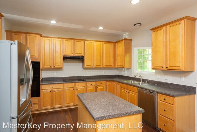 Building Photo - 4 br, 2.5 bath House - 2312 Pilot Mountain Ct