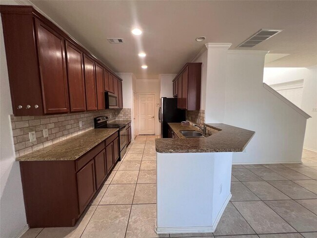 Foto del edificio - 6435 Calgary Woods Ln