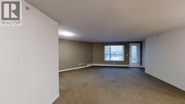 Photo du bâtiment - 9124-9196 96 Ave