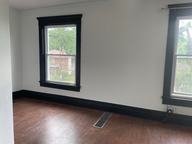 Living Room Three Large Windows - 6319 Monitor St
